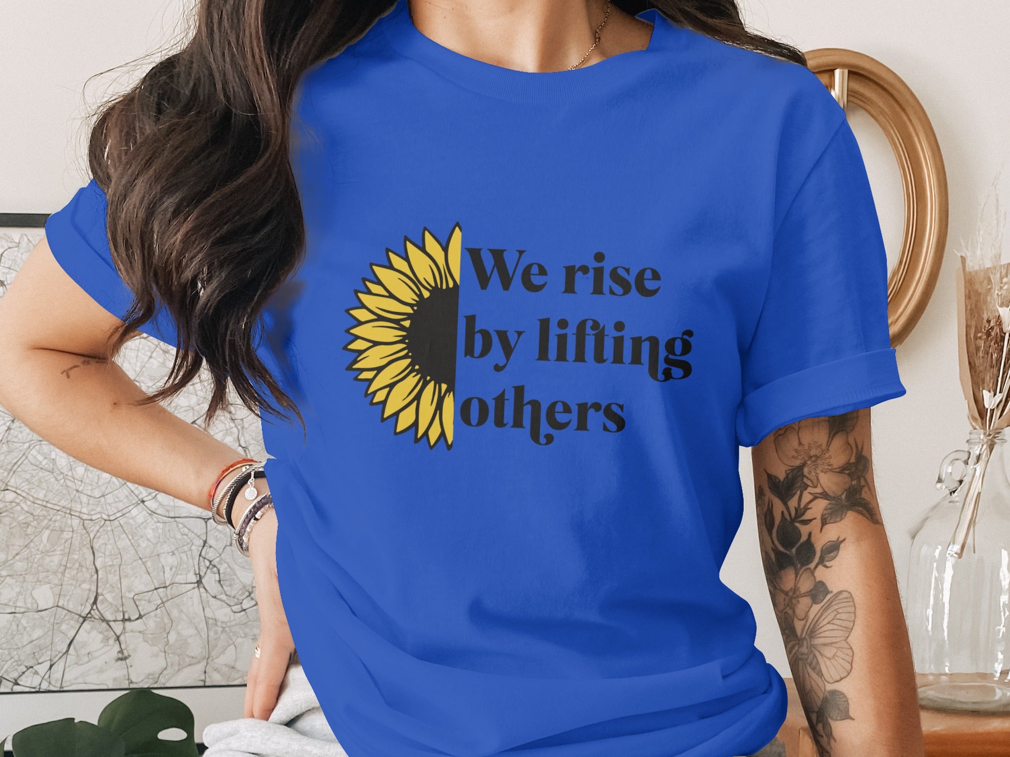 We Rise by Lifting Others Sunflower Graphic Tee